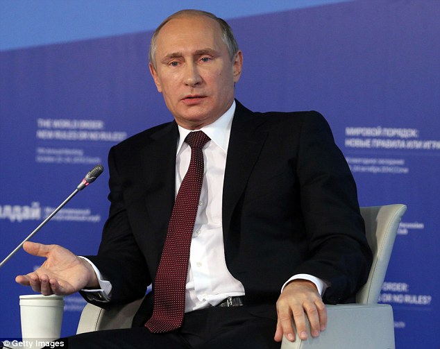 Putin says Western spies plot against Russia before polls