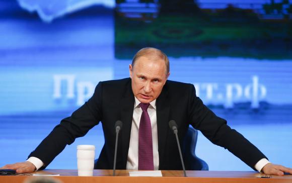 Putin says Russia won’t be intimidated over Crimea