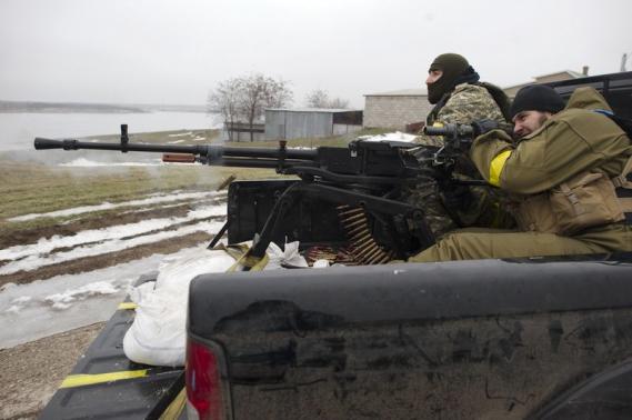 Ukraine rebels move to encircle government troops in new advance