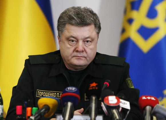 Ukraine’s Poroshenko says rebels have withdrawn significant amount of heavy weapons