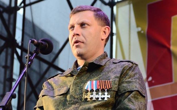 The head of the DPR Alexandr Zaharchenko signs the order of the conduct of election on 18th October