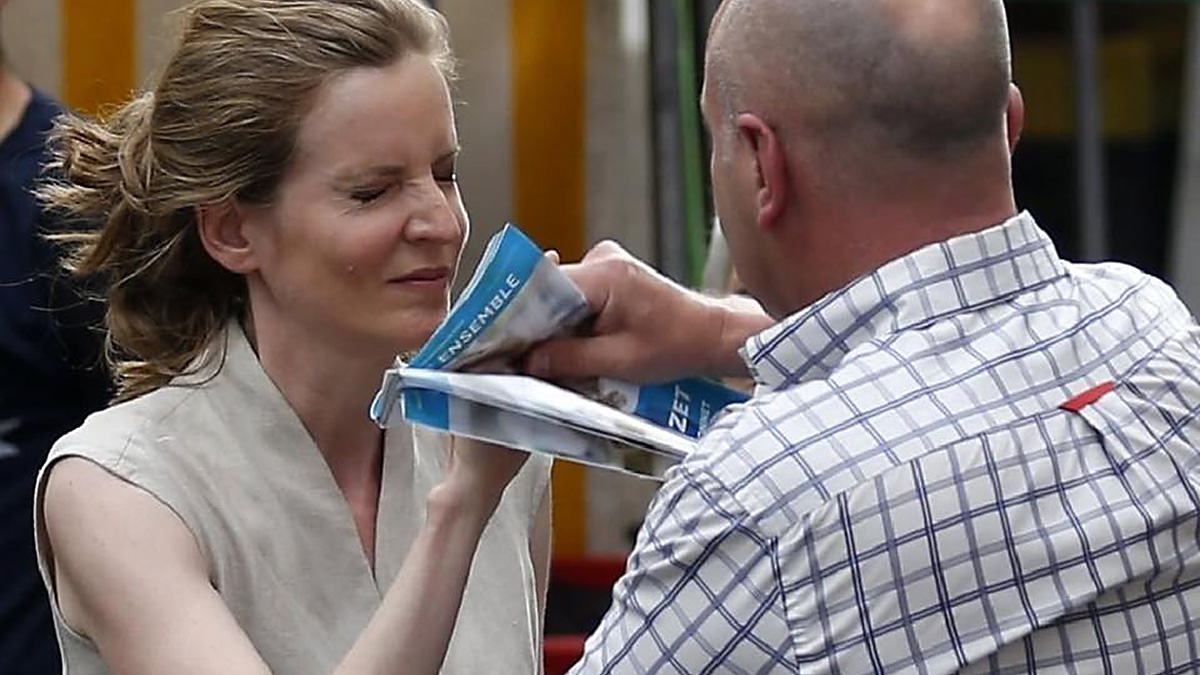 France: A political candidate and former minister slapped across the face with their flyers!